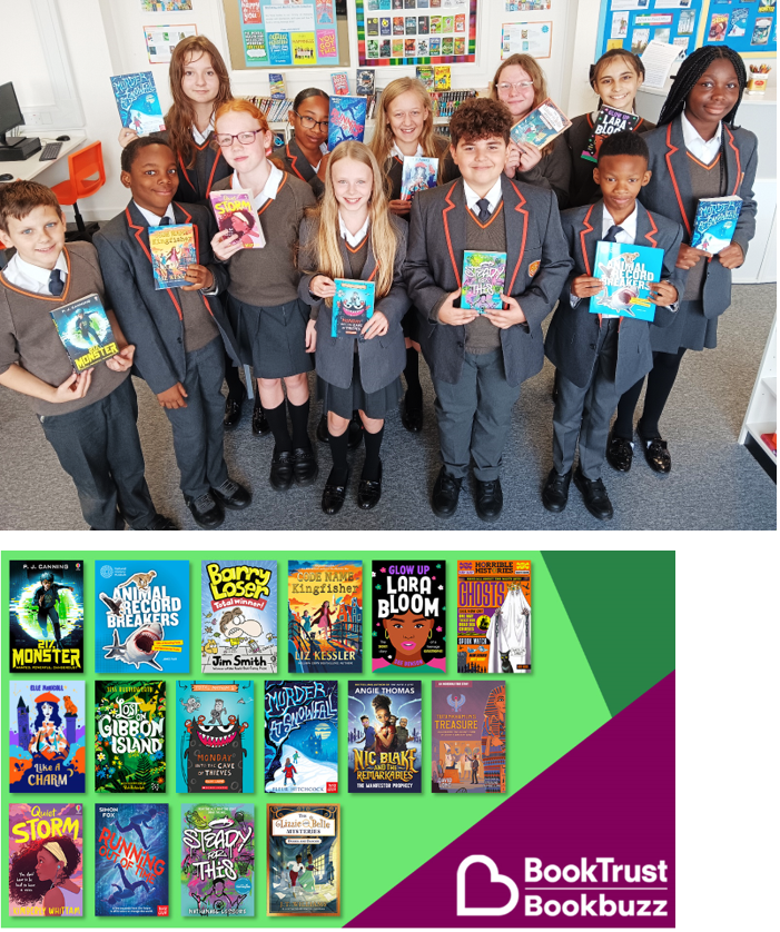 A group of children holding books

Description automatically generated