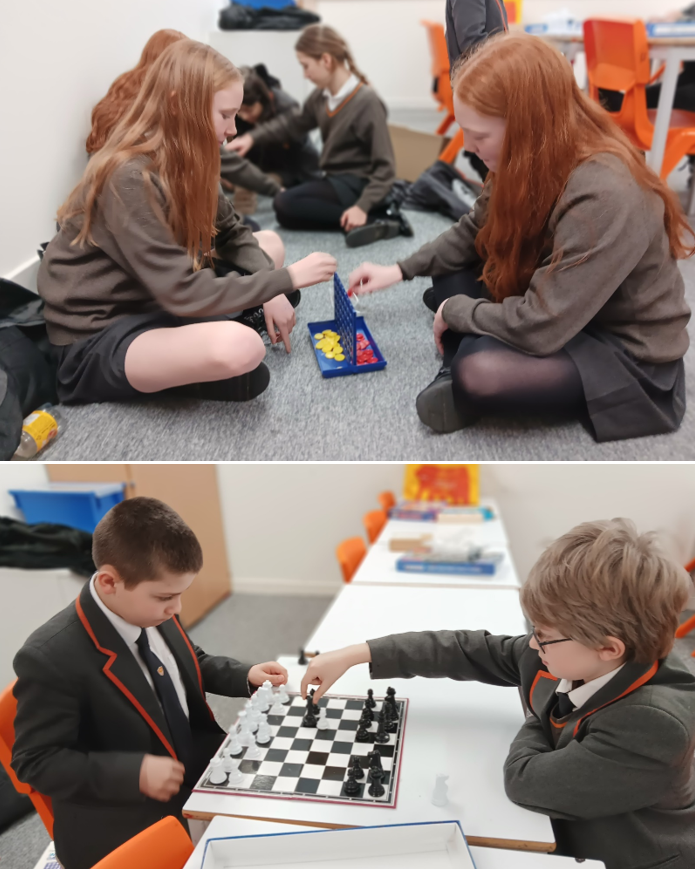 A group of kids playing chess

Description automatically generated