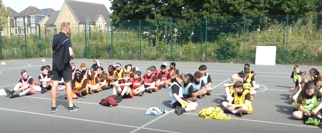 A group of people sitting on a court

AI-generated content may be incorrect.