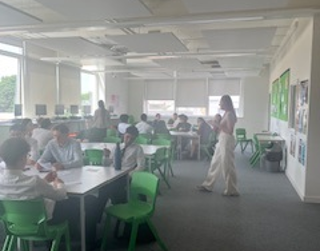 A group of people in a classroom
AI-generated content may be incorrect.